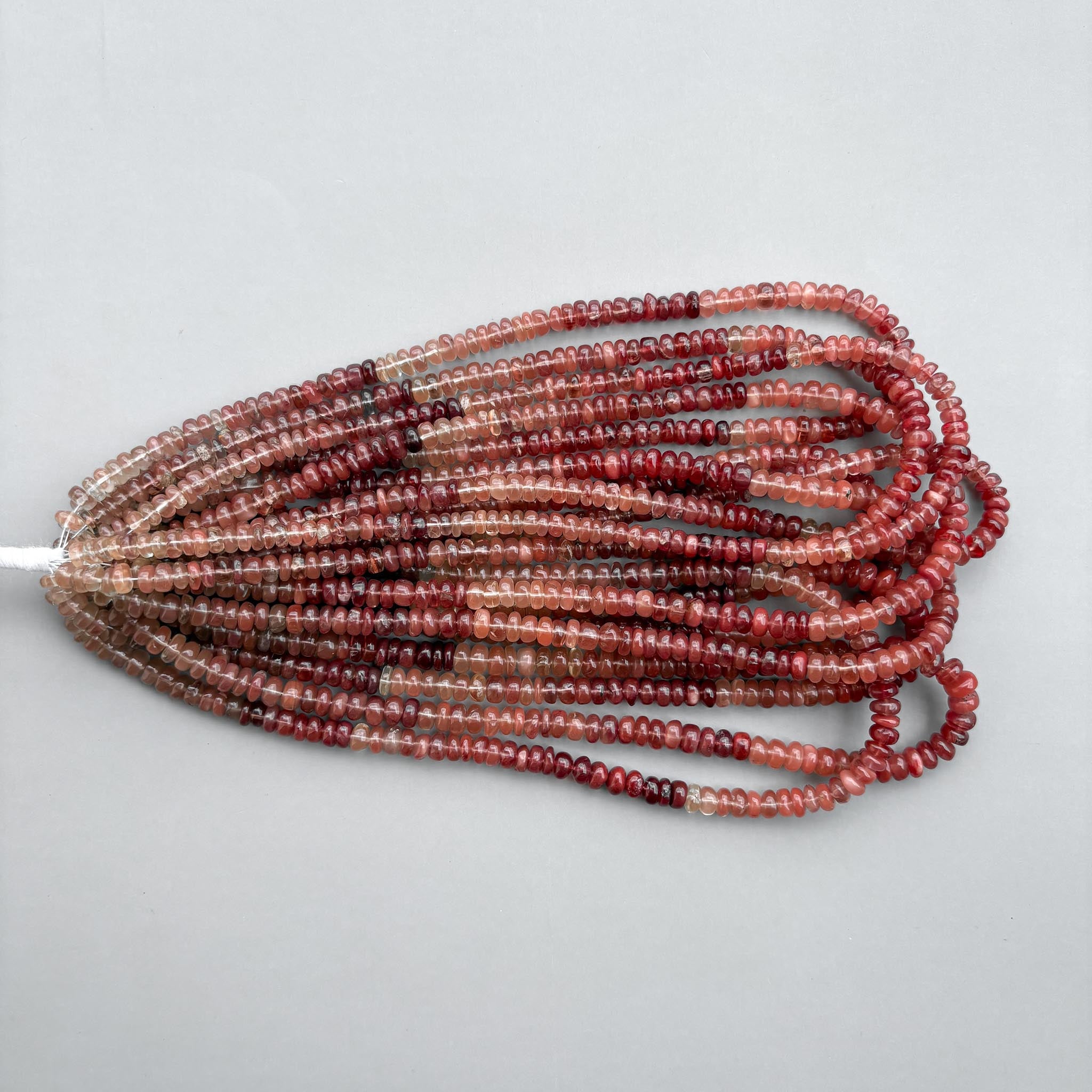 Natural andesine labradorite smooth beads on a 16-inch strand