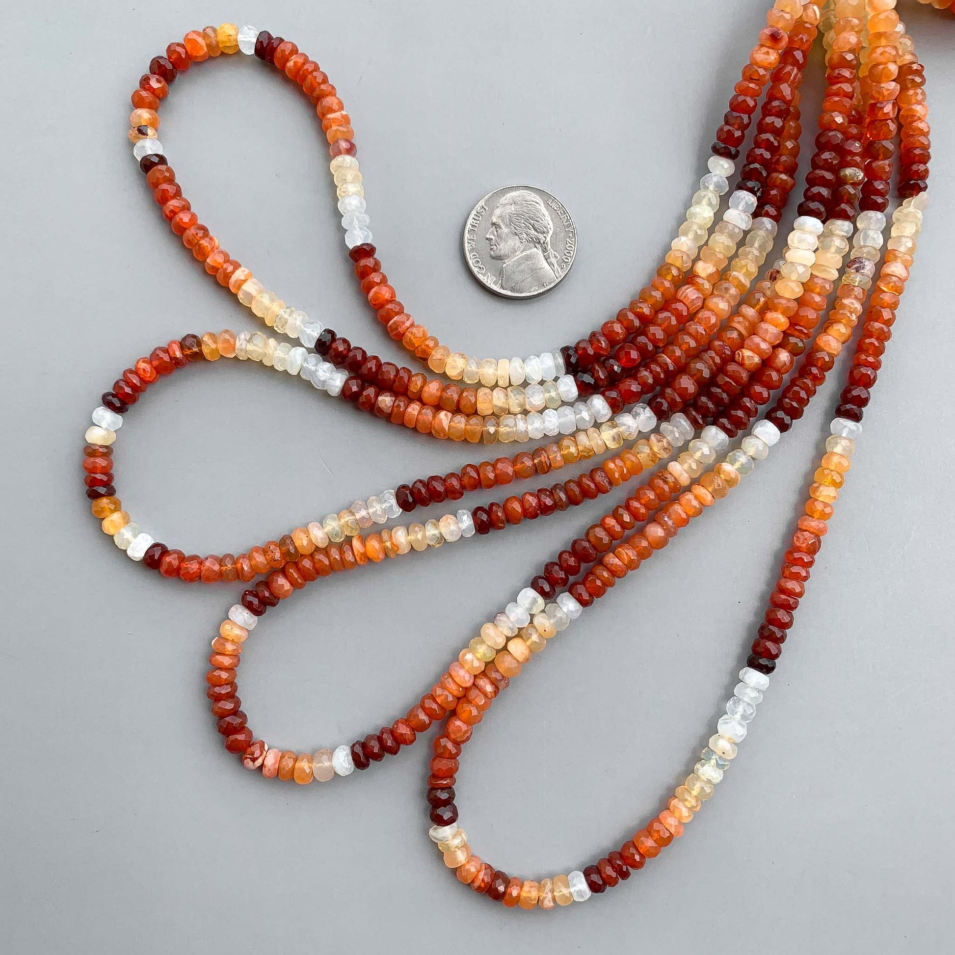 Natural Mexican fire opal faceted rondelle beads 5mm 15 inch strand