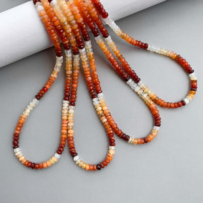 Natural fire opal faceted rondelle beads with vibrant warm colors