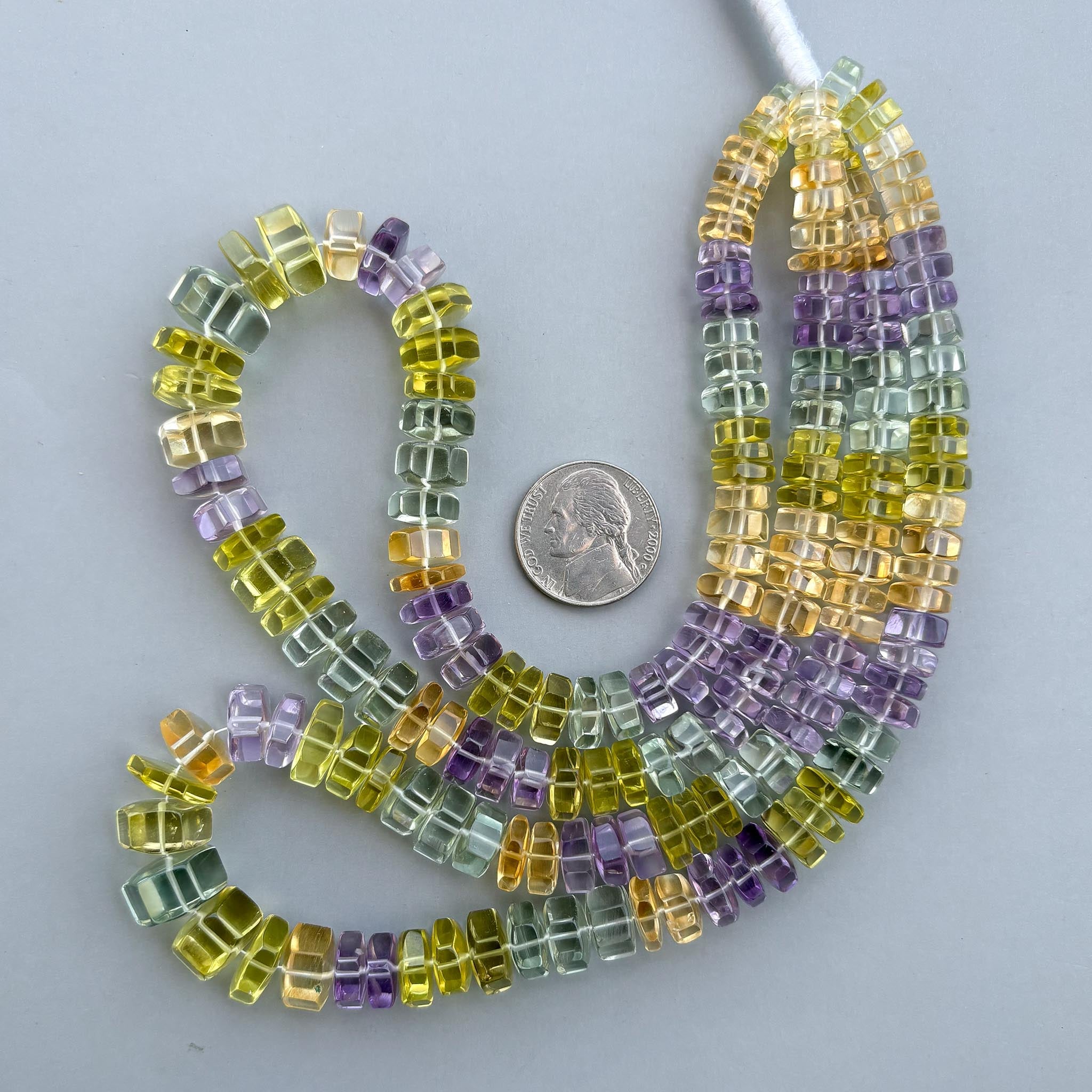 Natural multi gemstone faceted bolt beads 7–12mm 16 inch strand
