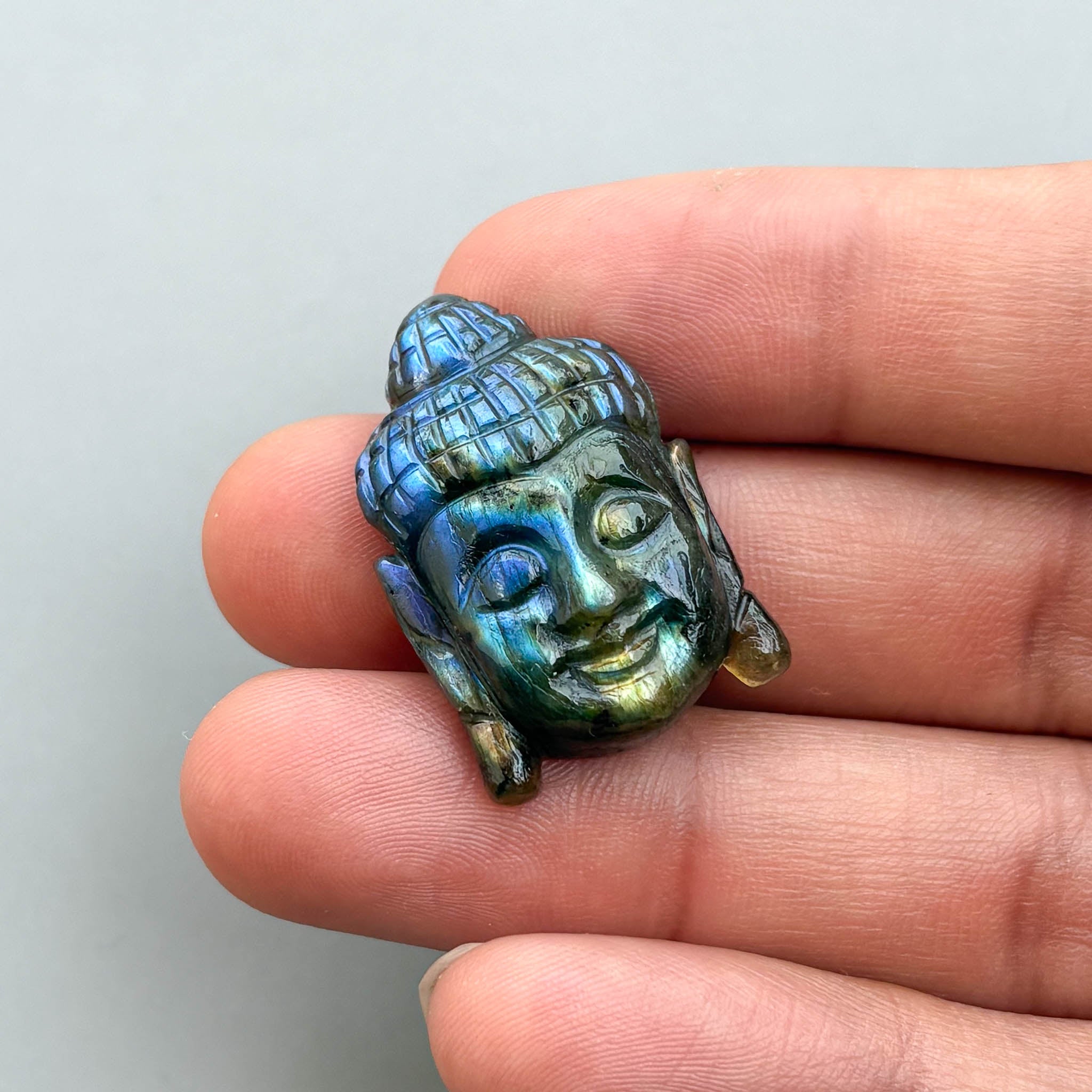 Hand carved labradorite Buddha gemstone carving for jewelry making
