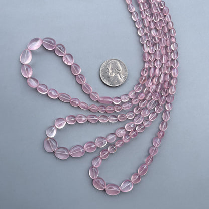 Small natural rose quartz nugget beads with soft pink color