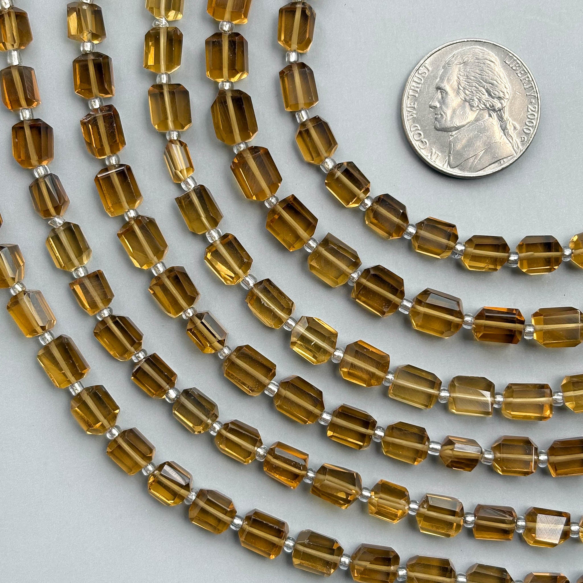 Natural whiskey quartz faceted tumble beads in golden brown tones