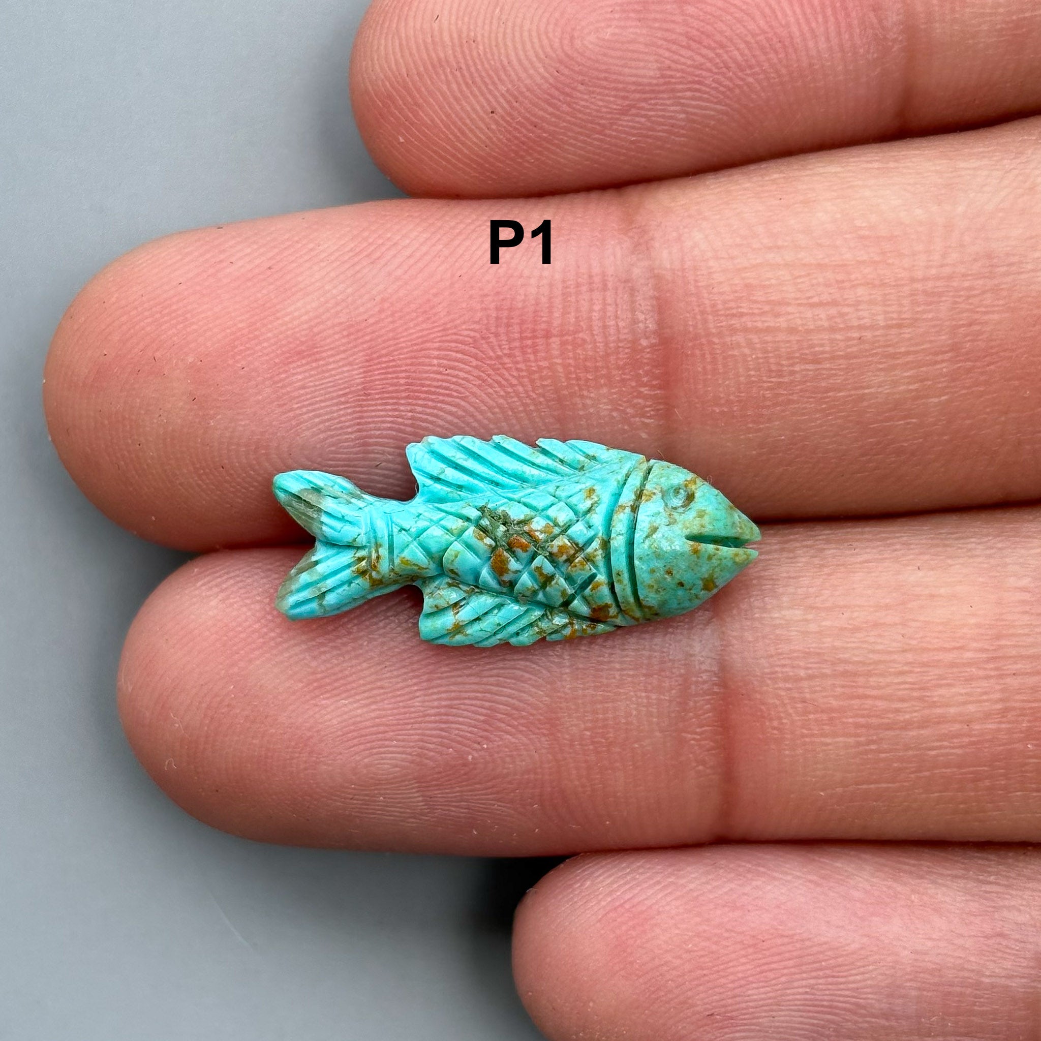 natural turquoise hand carved fish carving for jewelry making use which is handmade in Jaipur