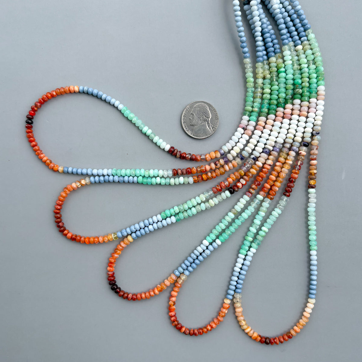 Natural multi opal smooth rondelle beads in mixed natural colors