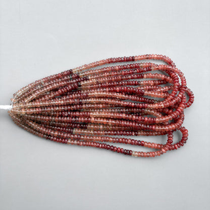 Natural andesine labradorite smooth beads on a 16-inch strand